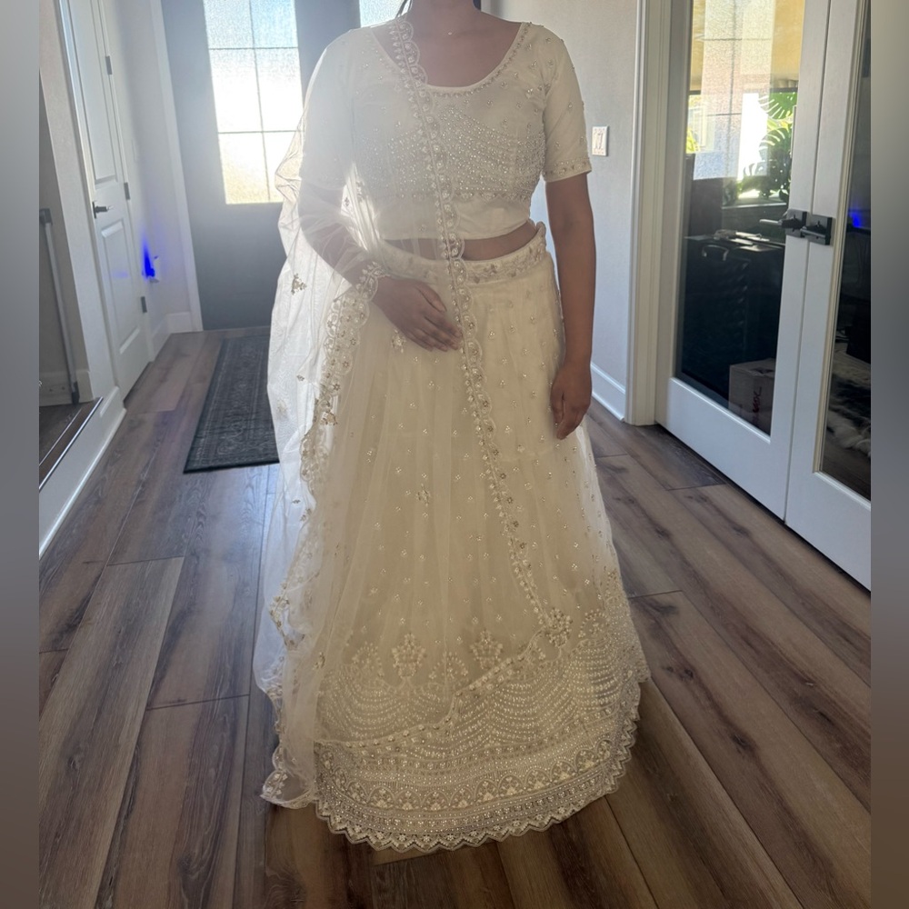 Ivory Indian Lehenga with additional Gold Blouse